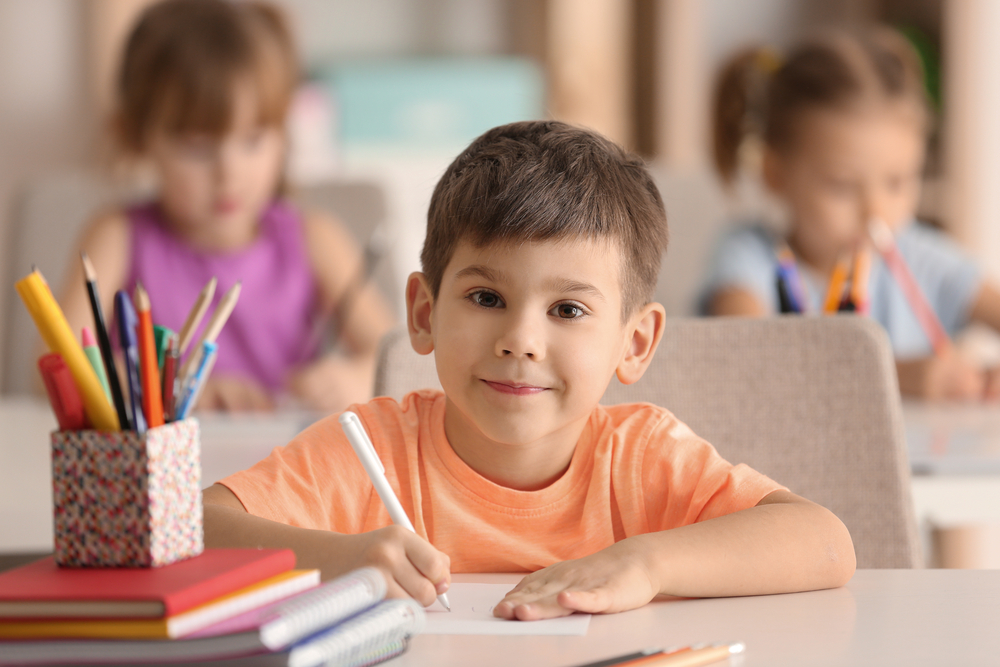 Child drawing in school