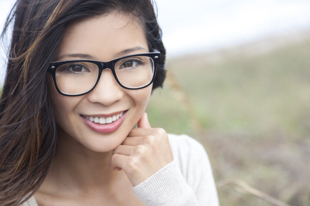 Asian Woman Smiles with Glasses | The Air Cleaner Store
