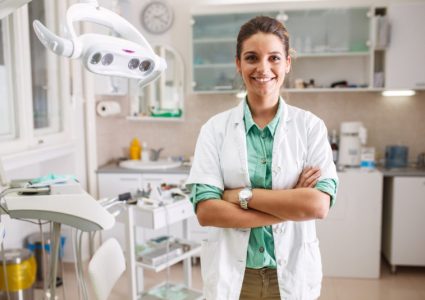Dentist w arms folded For medical practices